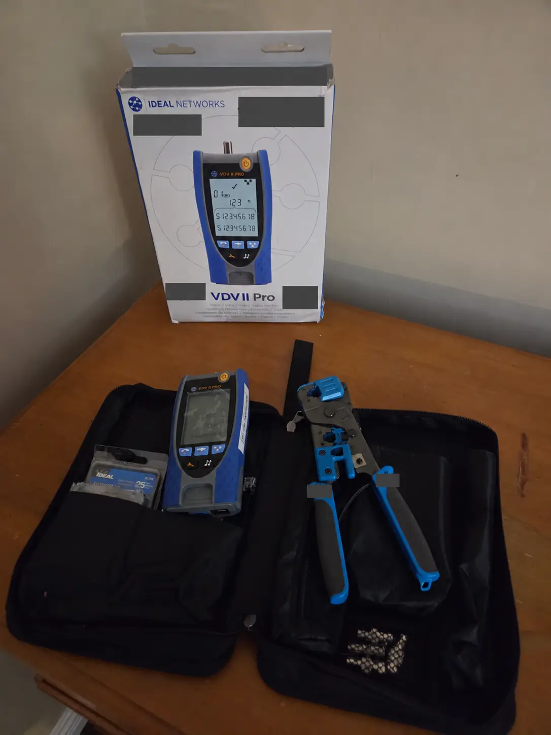 Albert’s original IDEAL Networks VDV II Pro cable tester and kit, with personal markings obscured